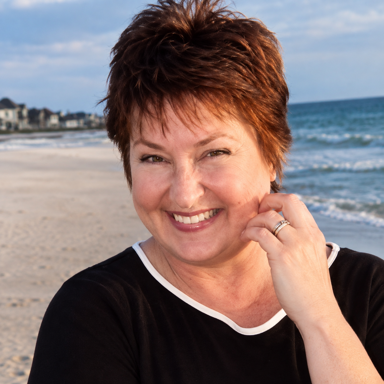 Deanna Hansen-Doying smiling on the beach